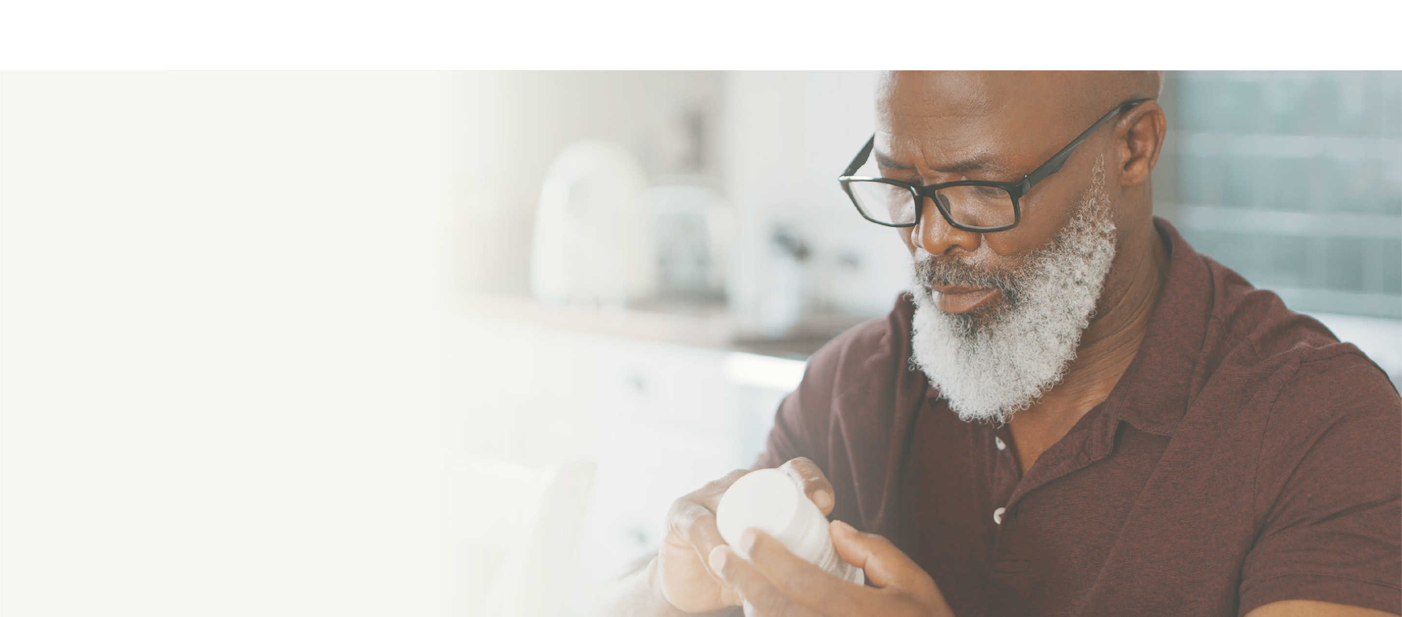 How to take Piqray, image of man holding pill bottle