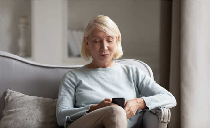 Useful resources, image of woman on sofa
