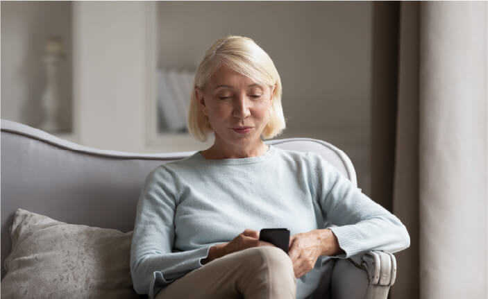 Useful resources, image of woman on sofa